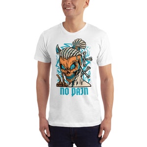 May include: White t-shirt with a graphic of a skull with blue eyes and a topknot. The skull is surrounded by bones and the text "no pain" is printed below the skull.