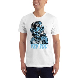 May include: White t-shirt with a blue cartoon illustration of a monkey wearing a hat and a chain. The text "YZY 100" is printed in blue below the illustration.