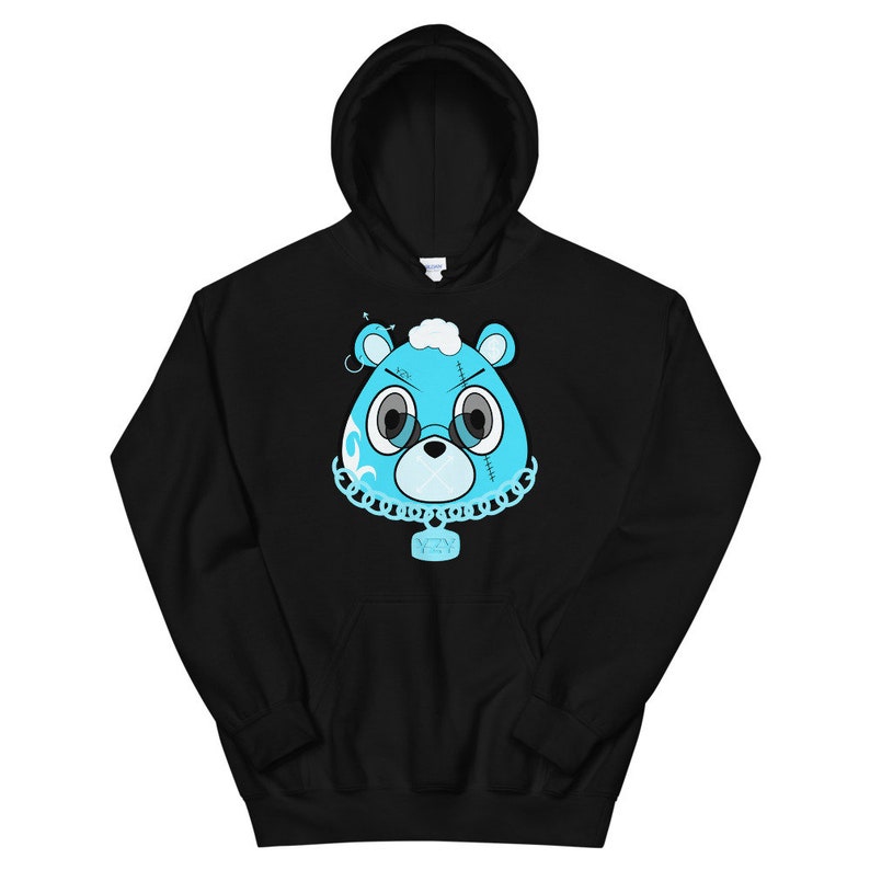 May include: Black hoodie with a blue cartoon bear wearing a chain with a tag that says "YZY".