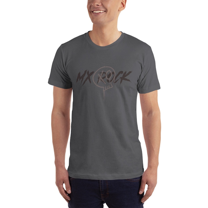 May include: A dark gray t-shirt with a black graphic design that says "MX ROCK" with a skull inside a circle.