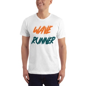May include: White t-shirt with the text "WAVE RUNNER" in orange and teal.