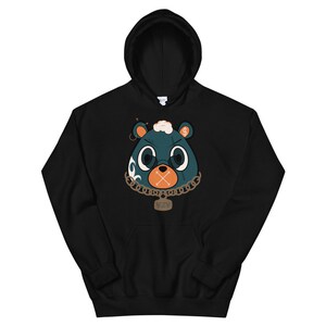 May include: Black hooded sweatshirt featuring a cartoon bear face with teal and orange accents. The bear has a gold chain necklace and a tag that says "YZY". The bear has a dollar sign on its ear.