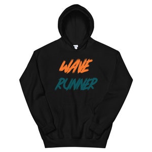 May include: Black hoodie with the words "WAVE RUNNER" in orange and teal lettering.
