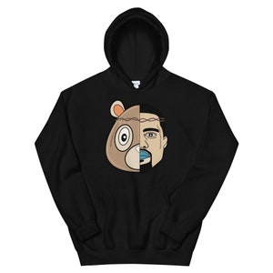 May include: Black hoodie featuring a graphic of a bear's head and a man's face, split down the middle. The bear has a crown of thorns on its head.