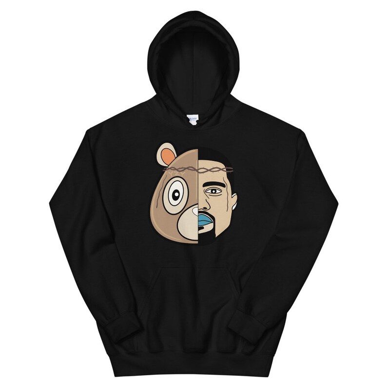 May include: Black hoodie featuring a graphic of a bear's head and a man's face, split down the middle. The bear has a crown of thorns on its head.