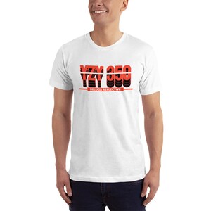 May include: White t-shirt with a red and black graphic that says "YZY 350 BELUGA REFLECTIVE".