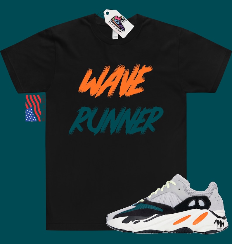 May include: Black t-shirt with "WAVE RUNNER" written in orange and teal on the front. A pair of grey, black, and white sneakers with orange accents.