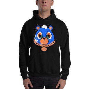 May include: Black hoodie with a blue and orange cartoon bear wearing a gold chain with a YZY pendant. The bear has a stitched mouth and a gold hoop earring.