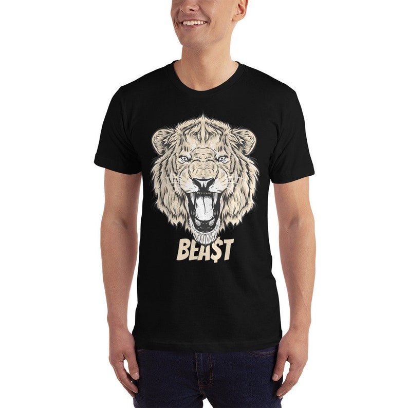 May include: Black t-shirt with a graphic of a lion's head roaring. The text "BEAST" is printed below the lion's head.