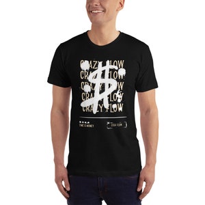 May include: Black t-shirt with a white dollar sign graphic and the text "CRAZY FLOW" repeated multiple times. The text "TIME IS MONEY" and "CASH FLOW" are also printed on the shirt.