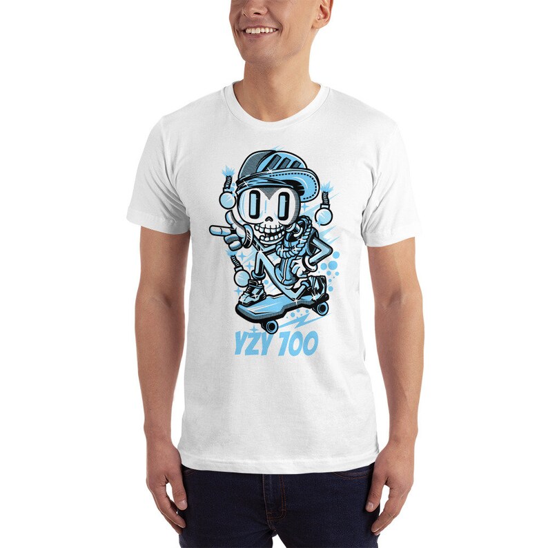 May include: White t-shirt with a blue cartoon skeleton wearing a blue hat and sunglasses, riding a skateboard with the text "YZY 700" underneath.