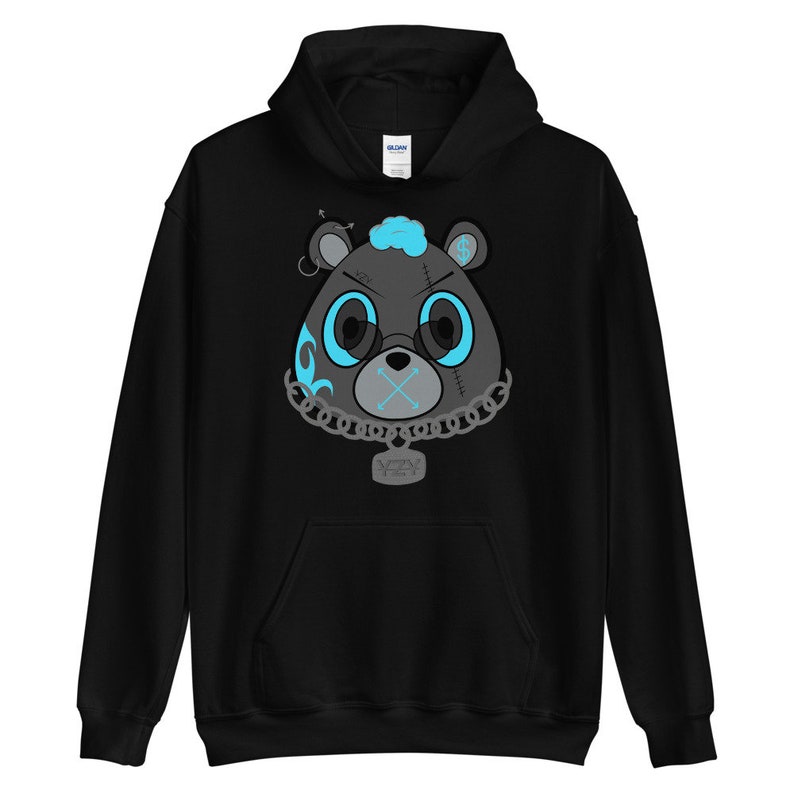 May include: Black hoodie with a graphic of a blue and black cartoon bear with a chain and a tag that says "YZY".