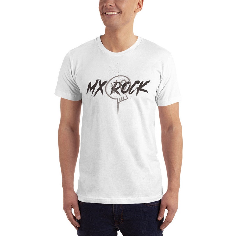 May include: White t-shirt with a black and gray skull graphic and the text "MX ROCK" printed on the front.