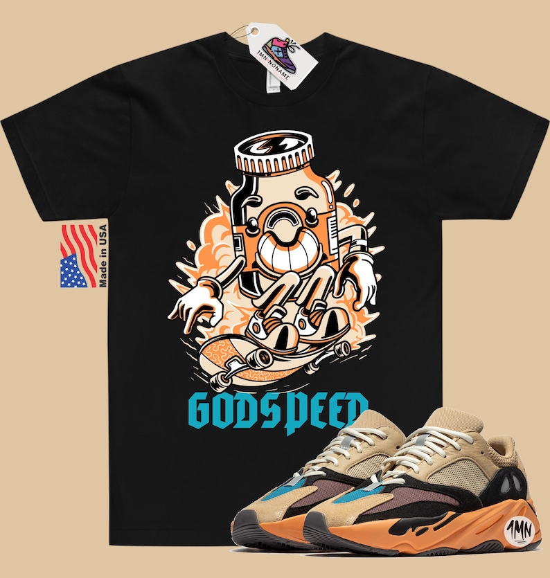 May include: Black t-shirt with a cartoon illustration of a pill bottle skateboarding with the text "Godspeed". A pair of tan, orange, and blue sneakers with the text "1MN" on the side.