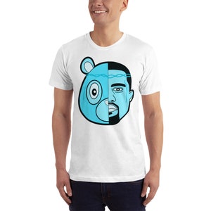 May include: White t-shirt with a blue and black graphic of a bear head with a barbed wire crown and a man's face on the right side.
