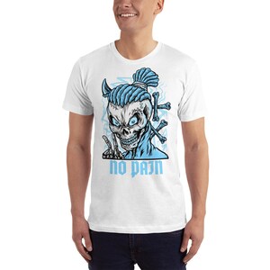 May include: White t-shirt with a blue skull graphic and the text "no pain". The skull has a blue mohawk and is wearing a blue jacket.