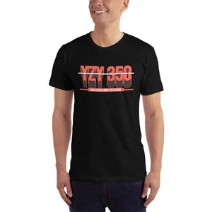 May include: Black t-shirt with a red and white graphic that says "YZY 350 BELUGA REFLECTIVE".