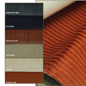 Rust close-up of ribbed velvet upholstery fabric, beside a color chart for velvet fabric for chairs