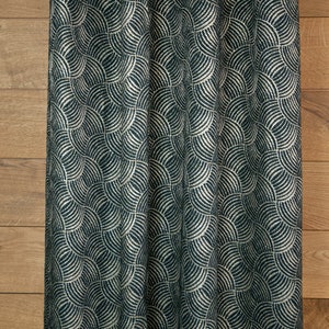 May include: A dark blue fabric with a white geometric pattern of overlapping semi-circles. The fabric has a textured, woven look.