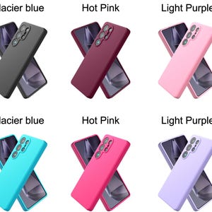 May include: A collection of six smartphone cases in various colors, including black, dark red, light pink, bright blue, hot pink, and light purple. Each case features a rectangular shape with a cutout for a multi-lens camera system on the back.