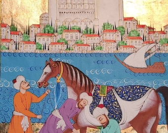 May include: A detailed miniature painting depicting a scene of three men tending to a horse. The horse is brown and white with a blue and white saddle. The men are wearing colorful clothing and turbans. The background features a cityscape with a mosque in the distance.