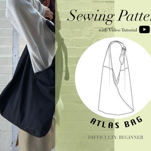 Könnte beinhalten: Ein Schnittmuster für eine schwarze Atlas-Tasche mit einem Video-Tutorial. Das Schnittmuster ist für Anfänger geeignet.