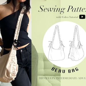 May include: A sewing pattern for a beige Beau Bag with a gathered detail. The pattern includes a video tutorial and is rated as intermediate to advanced difficulty.