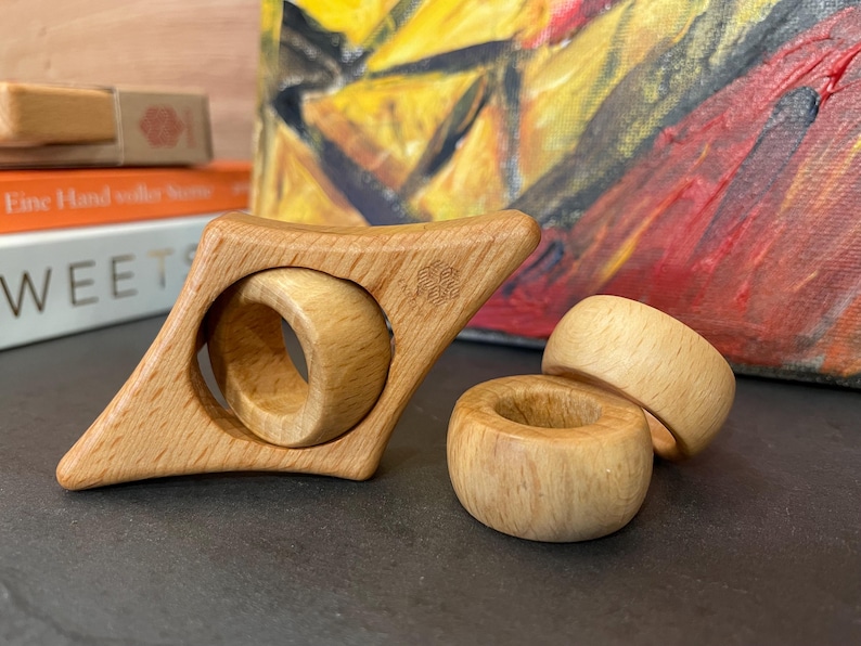 Buchseitenhalte, Buchenholz, einzigartig mit Innenringe zum wechseln die als Gelenk dienen. Der ENRECY Book Page Holder ist einzigartig und hebt sich von dadurch von anderen Buchseitenhaltern ab.