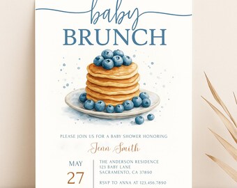May include: A baby shower invitation with a watercolor illustration of a stack of pancakes topped with blueberries. The invitation is for a baby brunch on May 27th at 2 PM. The text on the invitation reads "baby brunch" and "Jenn Smith".