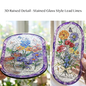 May include: Two oval suncatchers featuring 3D raised lead lines and stained glass style floral designs. One displays "Nana's Garden" with names Robert, Kevin, George, Eric. The other shows "Vailyn's Garden" with names Michael, Olivia, James, Sophie, Daniel, Charlotte, Benjamin.
