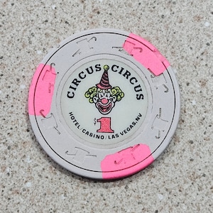 Vintage 1990 Circus Circus Casino 1 Dollar Table Clay Chip With The Hat & Cane Mold And 3 Pink Line Inserts- Las Vegas, Nevada
