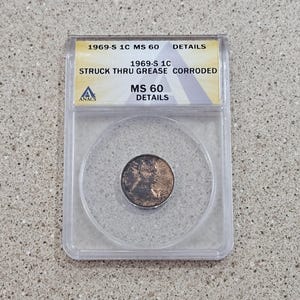 Vintage 1969-S 1C Lincoln Memorial 1 Cent Mint Error Penny Coin ANACS Slabbed & Graded At Struck Thru Grease Corroded MS 60 Details- RARE