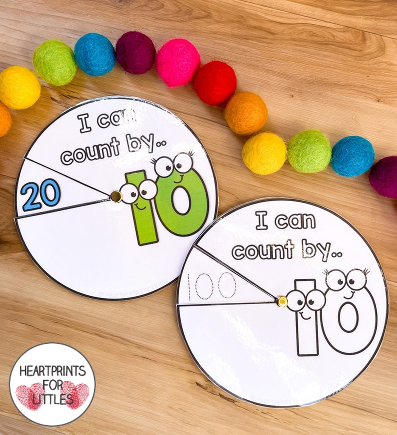 May include: Two colorful printable counting wheels with the text "I can count by..." and the number 10. One wheel has the number 20 on it and the other has the number 100.
