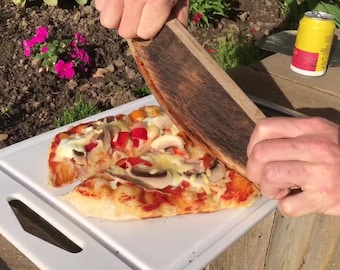 Oak Pizza Cutter made from whisky barrel lid.