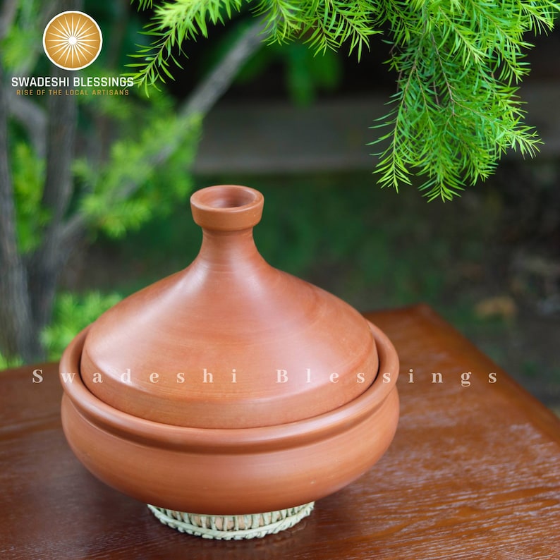 clay pot 
clay pot for cooking
clay cookware
swadeshi blessings
clay cooking pot
indian cookware
traditional cooking
clay pots
clay cookingpots with lid
pot
handi
claypots for cooking with spoon
indian kadai
claypan
clay biryani pot
Frying pan