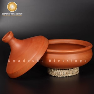 clay pot 
clay pot for cooking
clay cookware
swadeshi blessings
clay cooking pot
indian cookware
traditional cooking
clay pots
clay cookingpots with lid
pot
handi
claypots for cooking with spoon
indian kadai
claypan
clay biryani pot
Frying pan