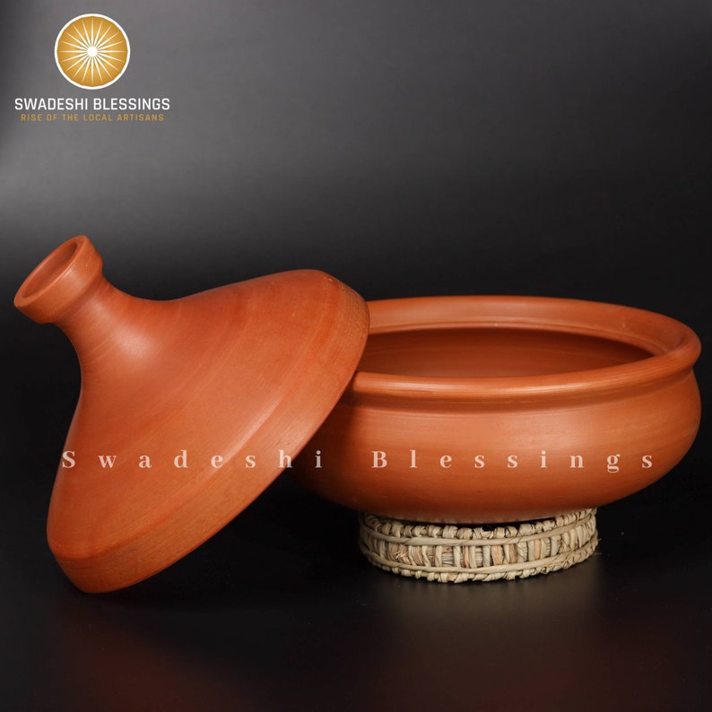 clay pot 
clay pot for cooking
clay cookware
swadeshi blessings
clay cooking pot
indian cookware
traditional cooking
clay pots
clay cookingpots with lid
pot
handi
claypots for cooking with spoon
indian kadai
claypan
clay biryani pot
Frying pan