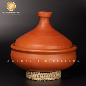 clay pot 
clay pot for cooking
clay cookware
swadeshi blessings
clay cooking pot
indian cookware
traditional cooking
clay pots
clay cookingpots with lid
pot
handi
claypots for cooking with spoon
indian kadai
claypan
clay biryani pot
Frying pan