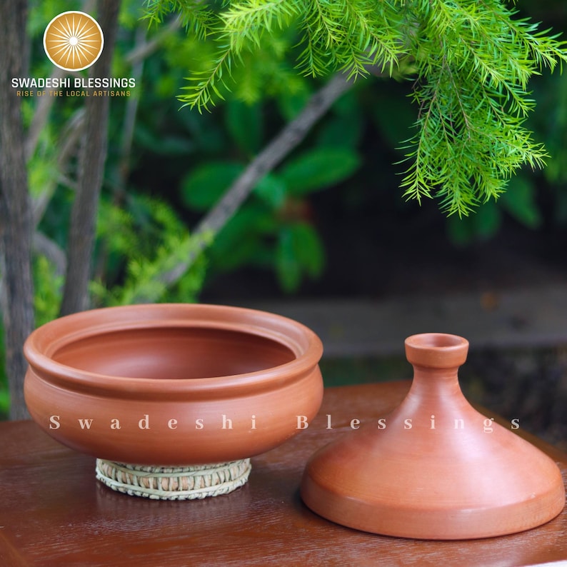 clay pot 
clay pot for cooking
clay cookware
swadeshi blessings
clay cooking pot
indian cookware
traditional cooking
clay pots
clay cookingpots with lid
pot
handi
claypots for cooking with spoon
indian kadai
claypan
clay biryani pot
Frying pan