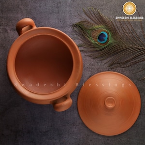 clay pot 
clay pot for cooking
clay cookware
swadeshi blessings
clay cooking pot
indian cookware
traditional cooking
clay pots
clay cookingpots with lid
pot
handi
claypots for cooking with spoon
indian kadai
claypan
clay biryani pot
Frying pan