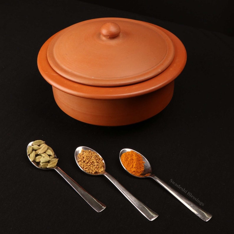 clay pot 
clay pot for cooking
clay cookware
swadeshi blessings
clay cooking pot
indian cookware
traditional cooking
clay pots
clay cookingpots with lid
pot
handi
claypots for cooking with spoon
indian kadai
claypan
clay biryani pot
Frying pan
