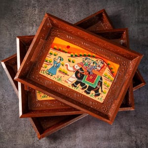 Ethnic trays
wedding gifts
housewarming gifts
decorative trays
wooden serving trays
antique wood tray
valet tray
catch all wood tray
Indian ethnic tray
wood desk tray
rustic wooden tray
Christmas gift
handmade wood tray
wood jewelry tray
serving tray 
Handcrafted 
HandPainted 
Embossed Wooden ethnic set of 3 
Kitchen Table Home Decor 
Dinning Gifts 
Restaurants 
Living Room 
Coffee Table 
tableware 
decoratives platters 
vintage tea bed storage
large tray
small tray
tea tray