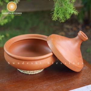 clay pot 
clay pot for cooking
clay cookware
swadeshi blessings
clay cooking pot
indian cookware
traditional cooking
clay pots
clay cookingpots with lid
pot
handi
claypots for cooking with spoon
indian kadai
claypan
clay biryani pot
Frying pan