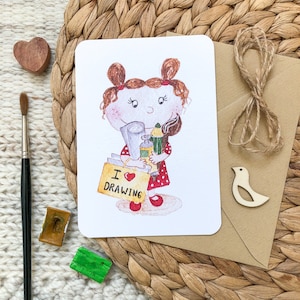 Postkarte mit einem süßen glücklichen Mädchen das Künstlerbedarf hält | Postkarte mit handgezeichnetem Aquarell von Julia Swan