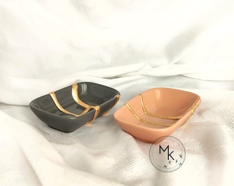 Couple of ceramic Kintsugi plates, pink and grey with gold finish, hand mended, unique piece