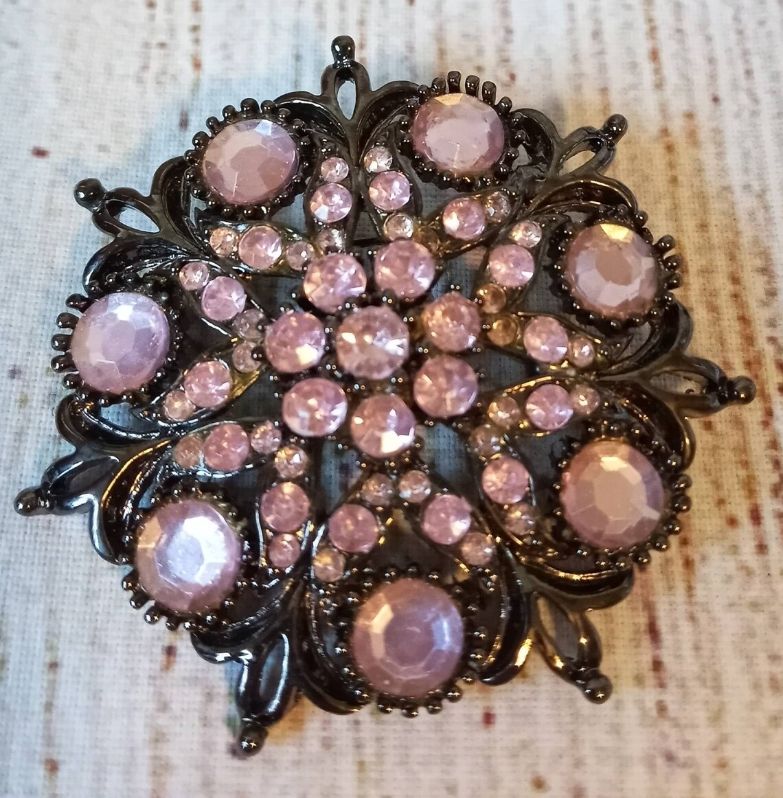 Pink Rhinestone pin brooch on black metal Etsy