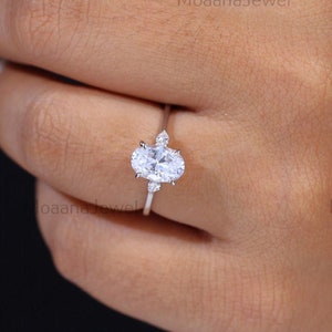 Oval Moissanite Three Stone Ring: 14K Yellow Gold Trilogy