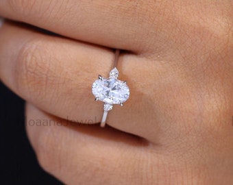 Oval Moissanite Three Stone Ring: 14K Yellow Gold Trilogy