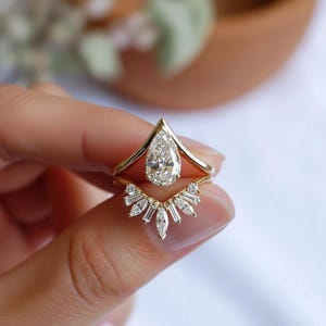 Pear Moissanite Solitaire Ring with Diamond V-Shaped Chevron Band, 14K Yellow Gold Bridal Set