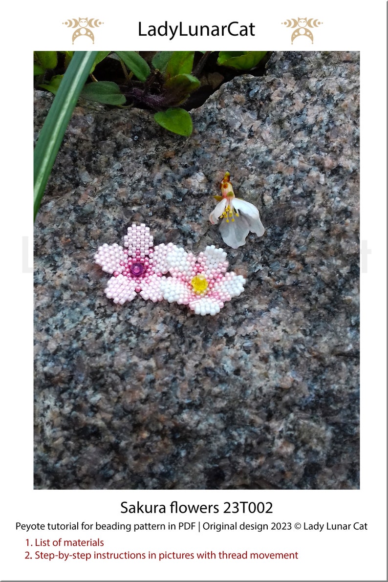 May include: Two beaded cherry blossom flowers, one pink with a pink center bead and one white with a yellow center bead, on a gray and brown textured rock surface. The text "Sakura flowers 23T002" is below the image.